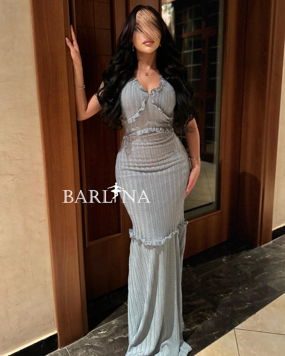 Soft dress with elegant ruffle accents