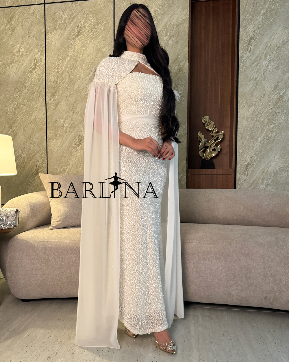 White dress with pearl embroidery and a transparent cape