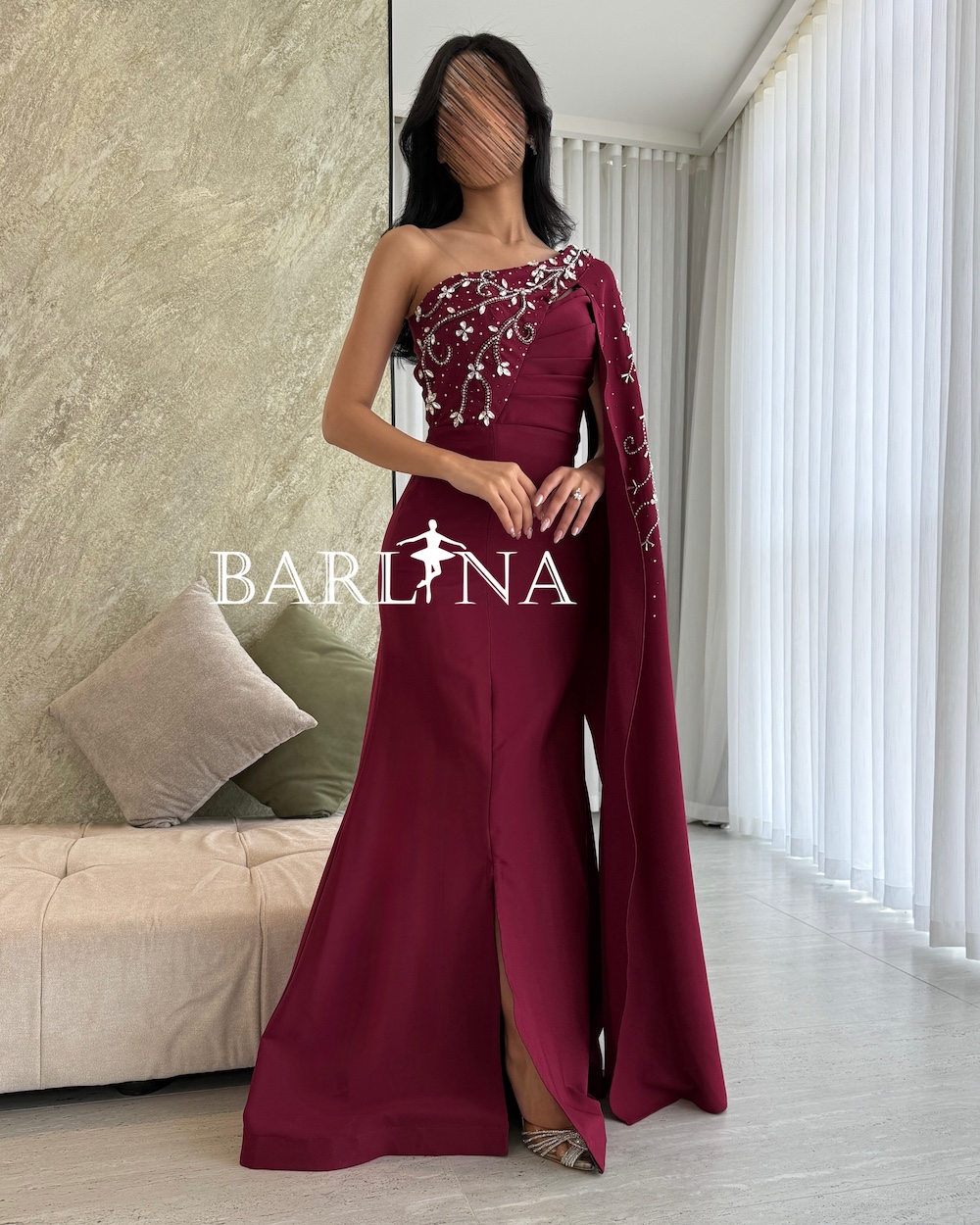 Burgundy one-shoulder dress with long cape