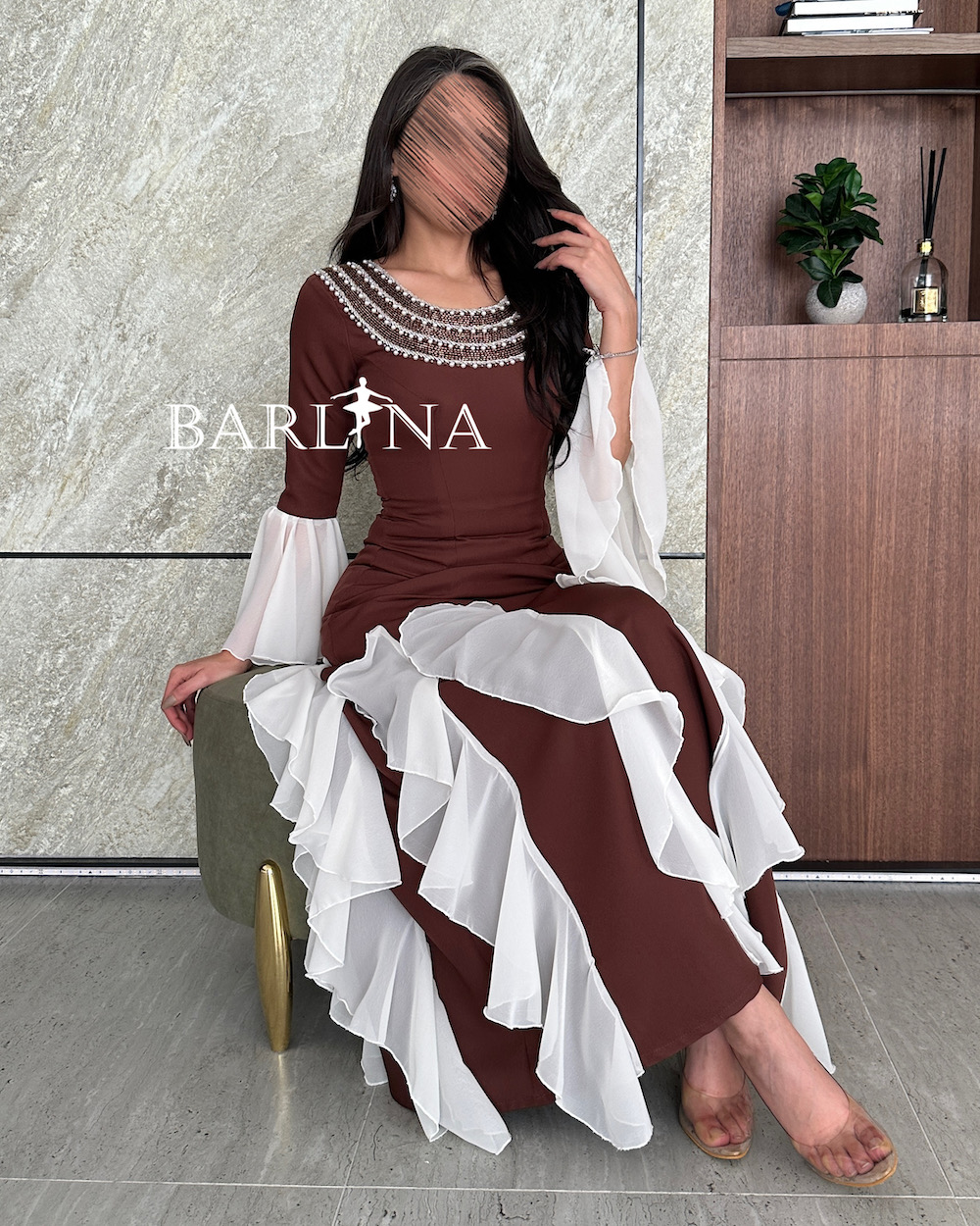 Brown dress with white details and pearl collar
