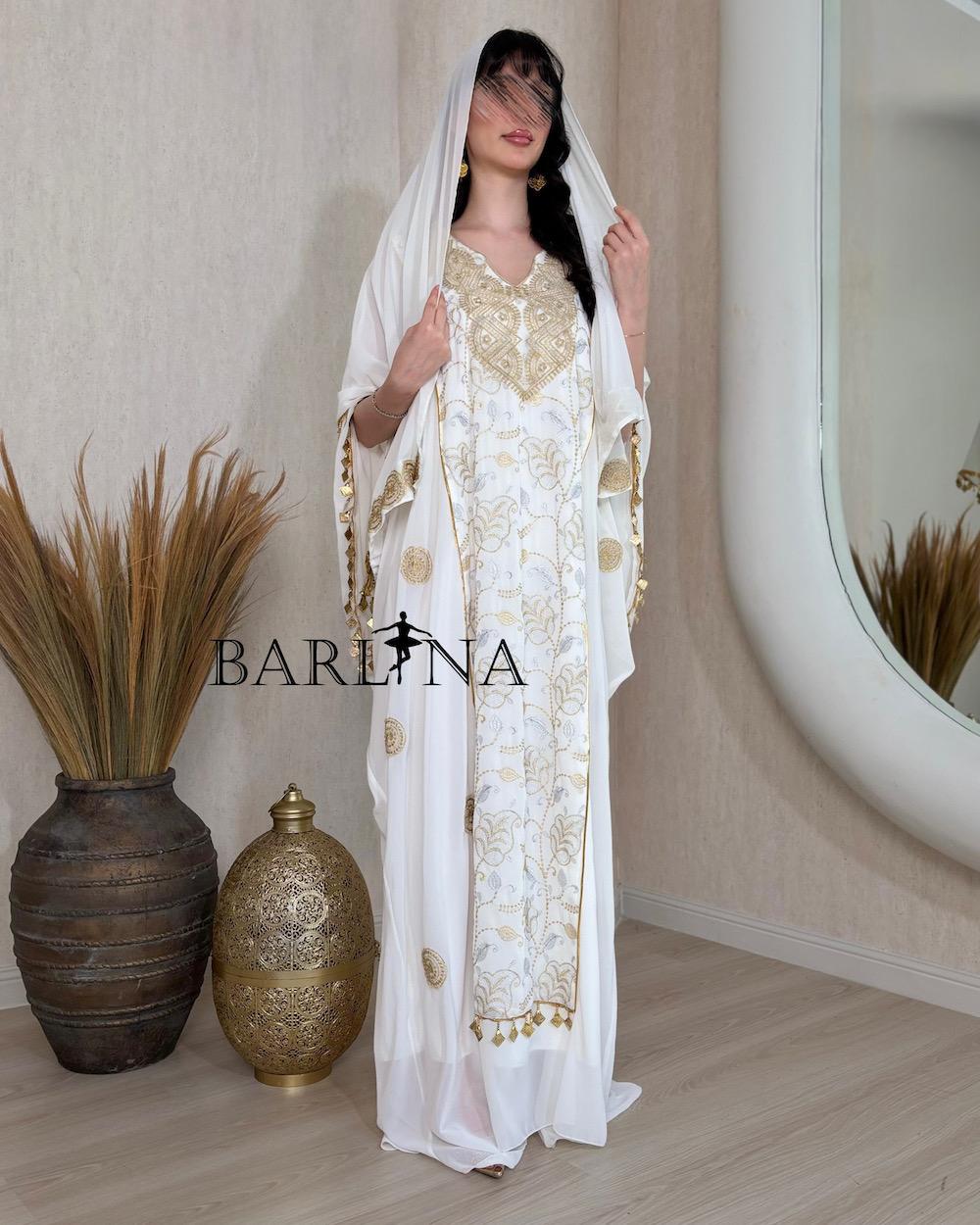 Luxurious jalabiya with gold embroidery and a shawl