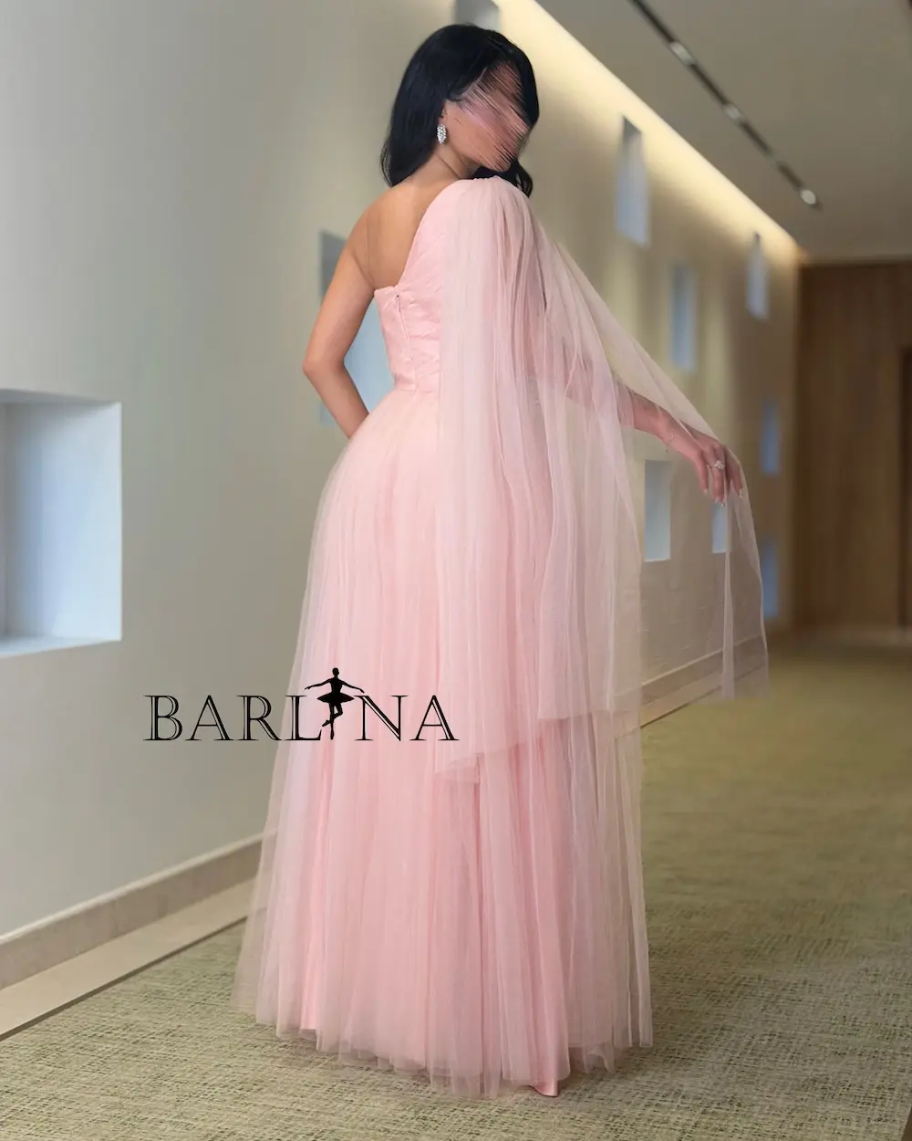 Pink one-shoulder evening dress with draped tulle