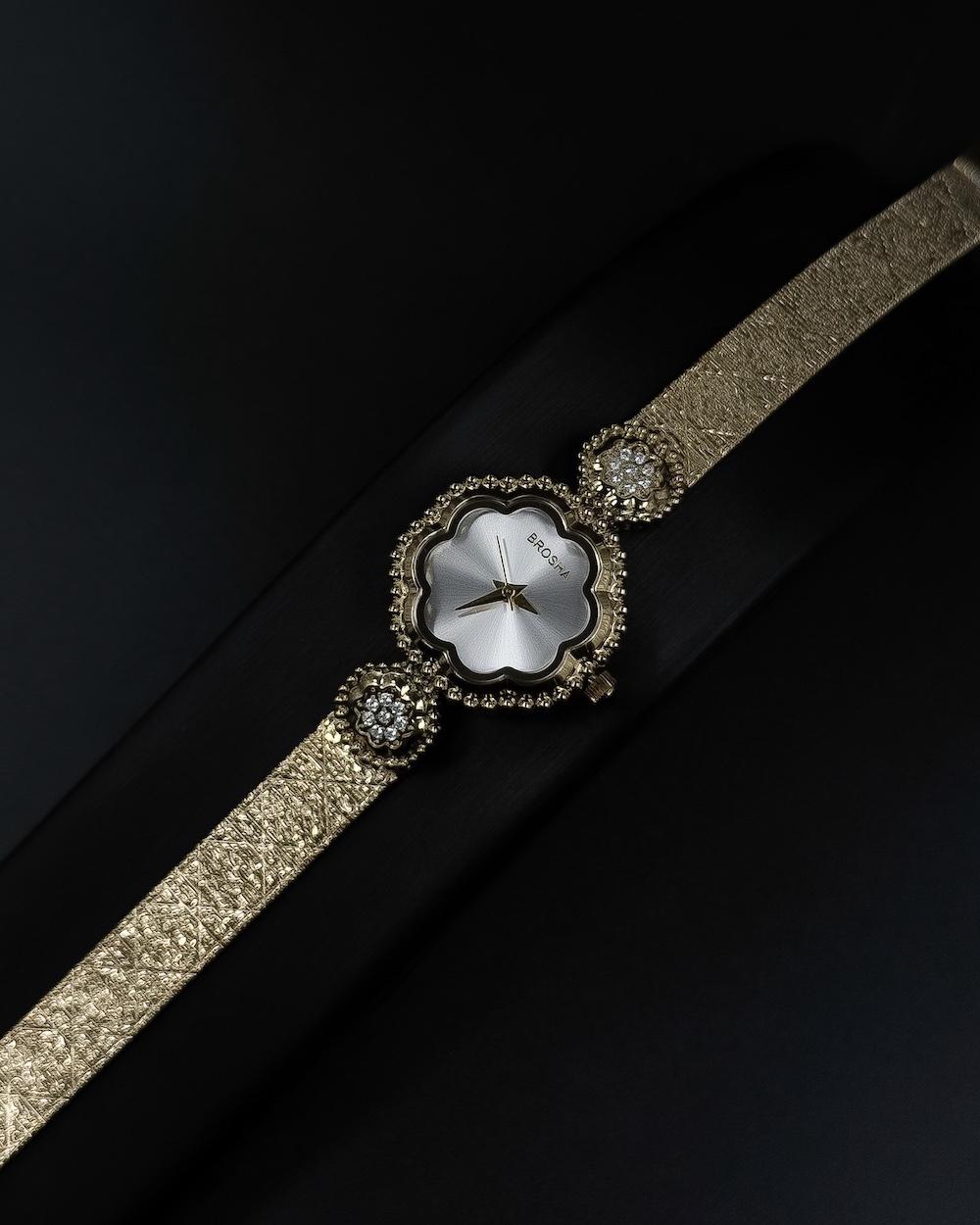 A delicate women's watch with an elegant floral design