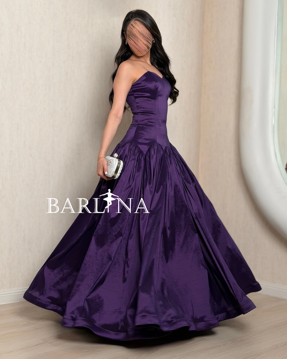 A royal purple dress with a soft sweetheart neckline A royal purple dress with a soft sweetheart neckline