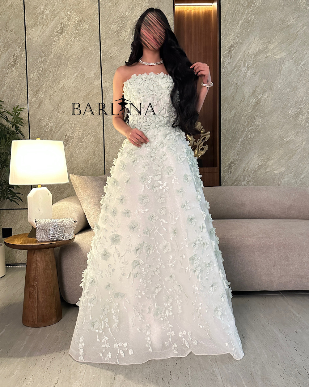 White dress with prominent rose embroidery