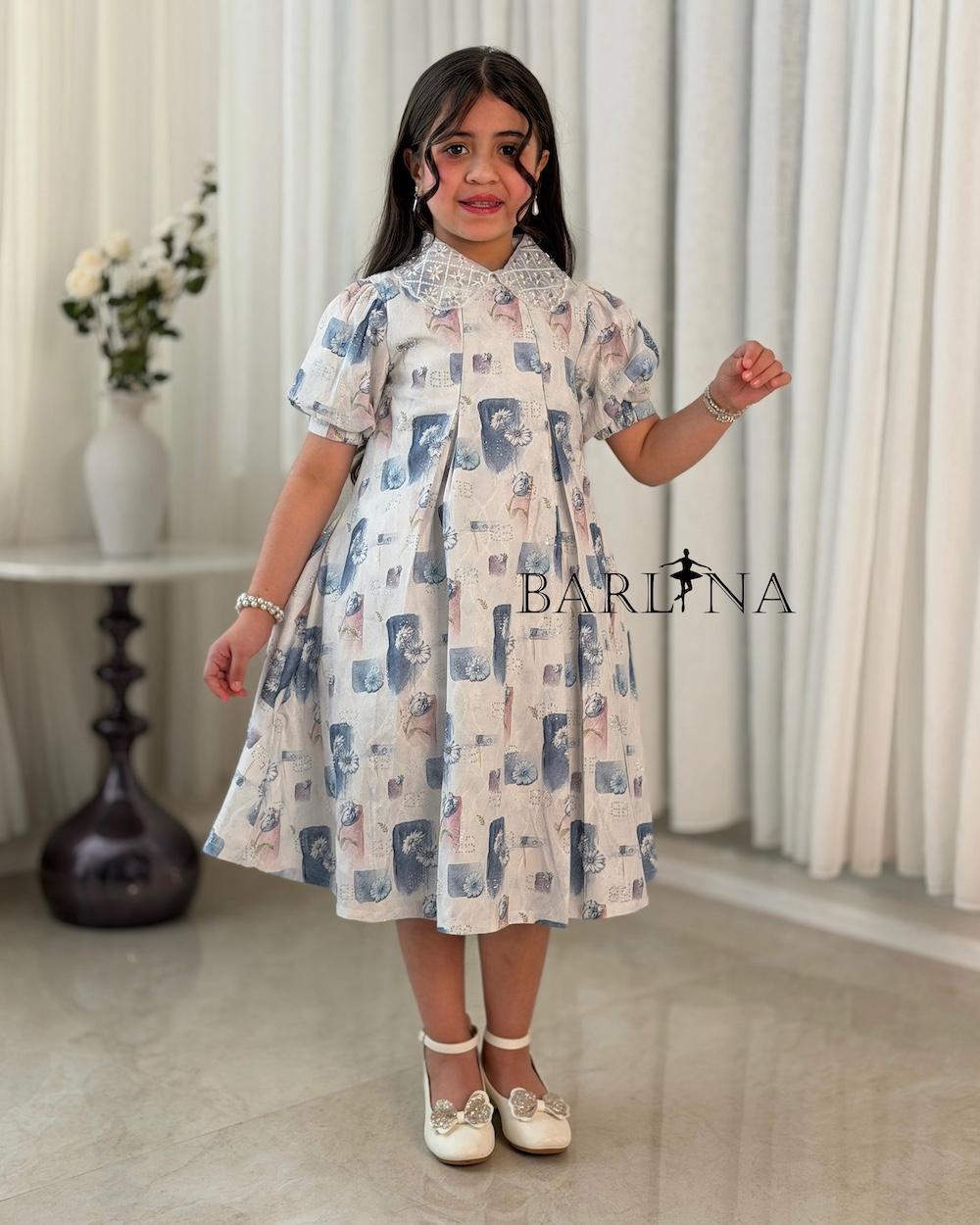Girls' dress decorated with printed patterns