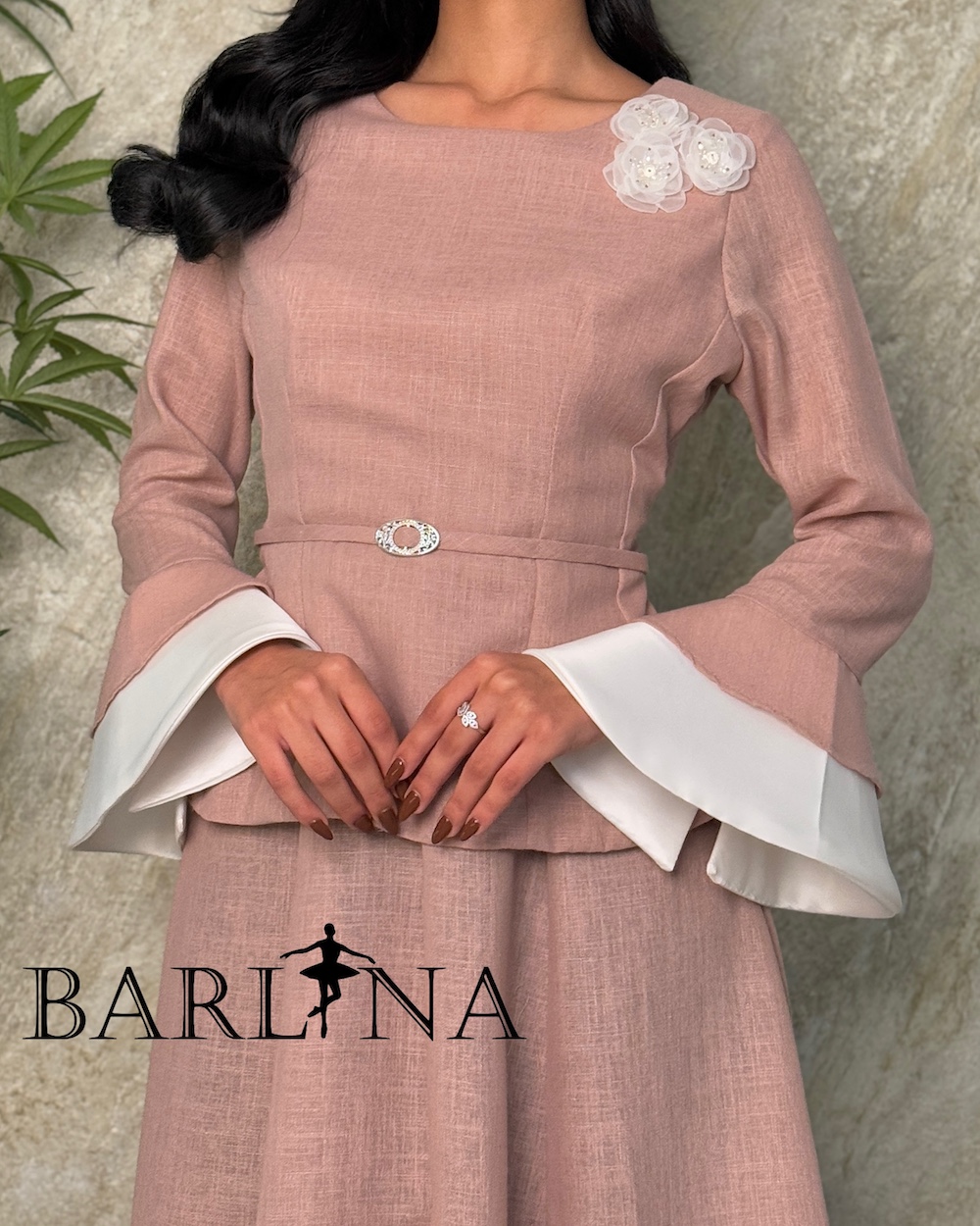 Classic pink dress with peplum design