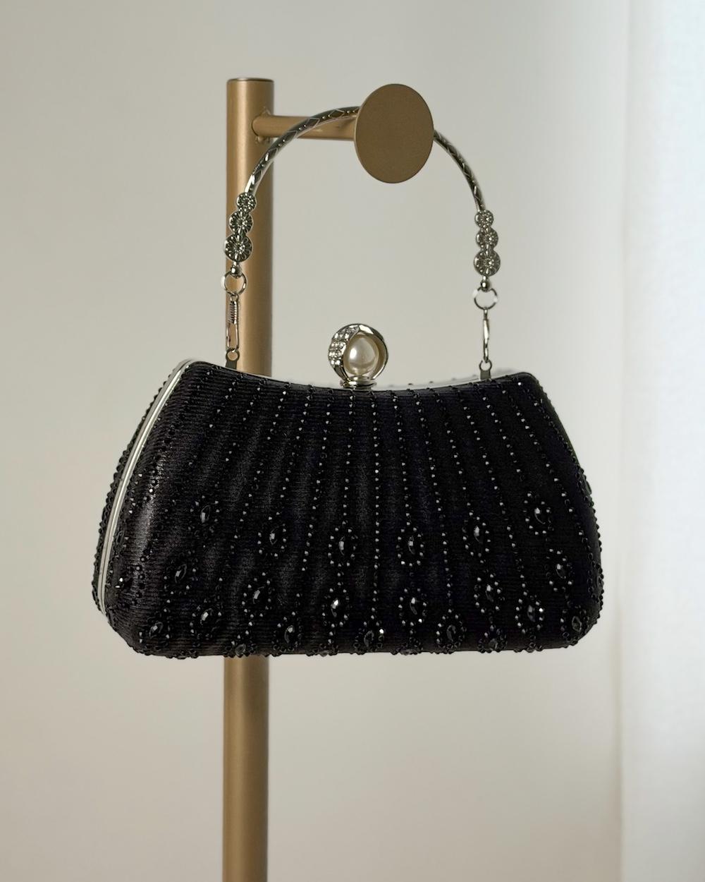 Crystal evening bag with royal pearl clasp