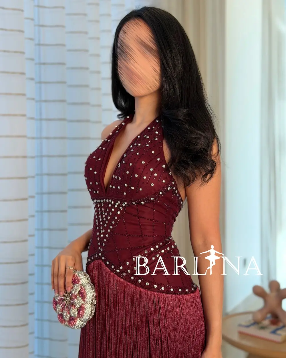 Burgundy halter dress with long fringe detailing Burgundy halter dress with long fringe detailing