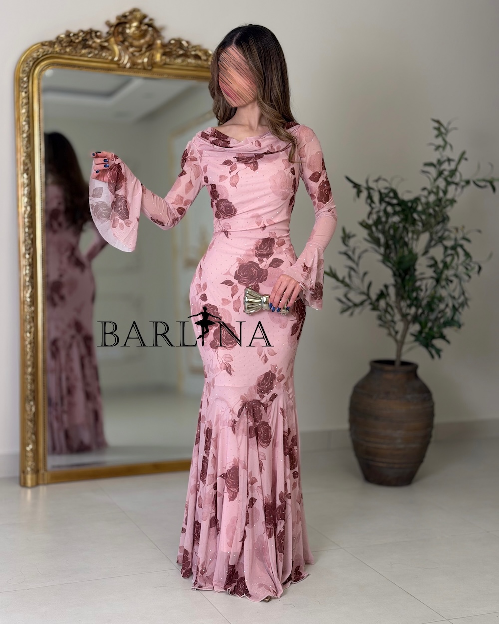 A fitted dress in a pink floral print
