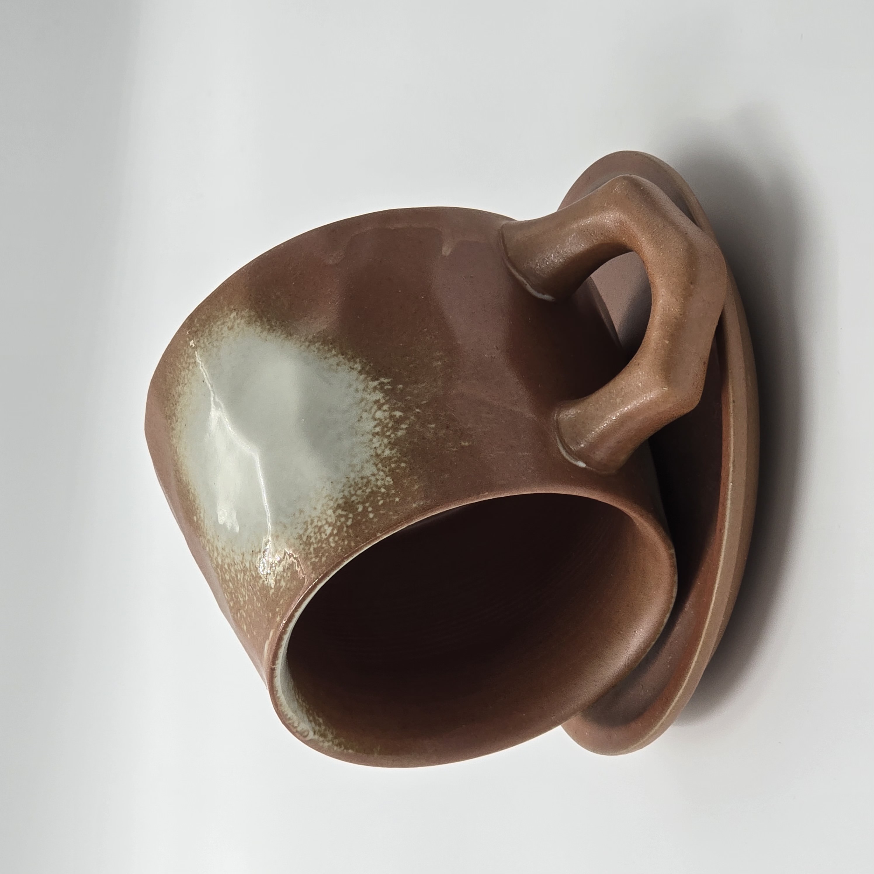 Feminine coffee cup with soft details