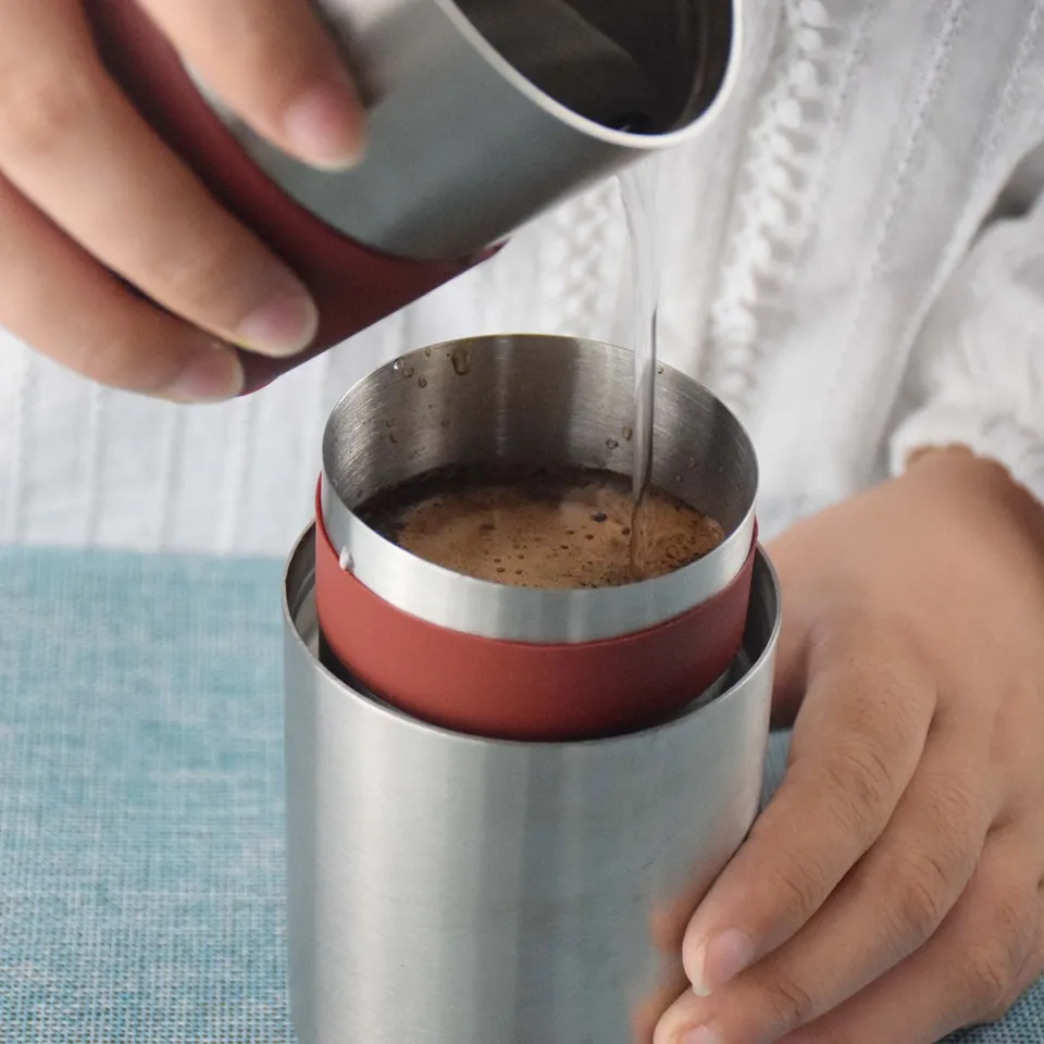 Multi-use manual coffee grinder with durable design