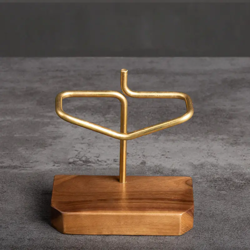 Experience premium craftsmanship with high-quality walnut wood and gleaming copper accents