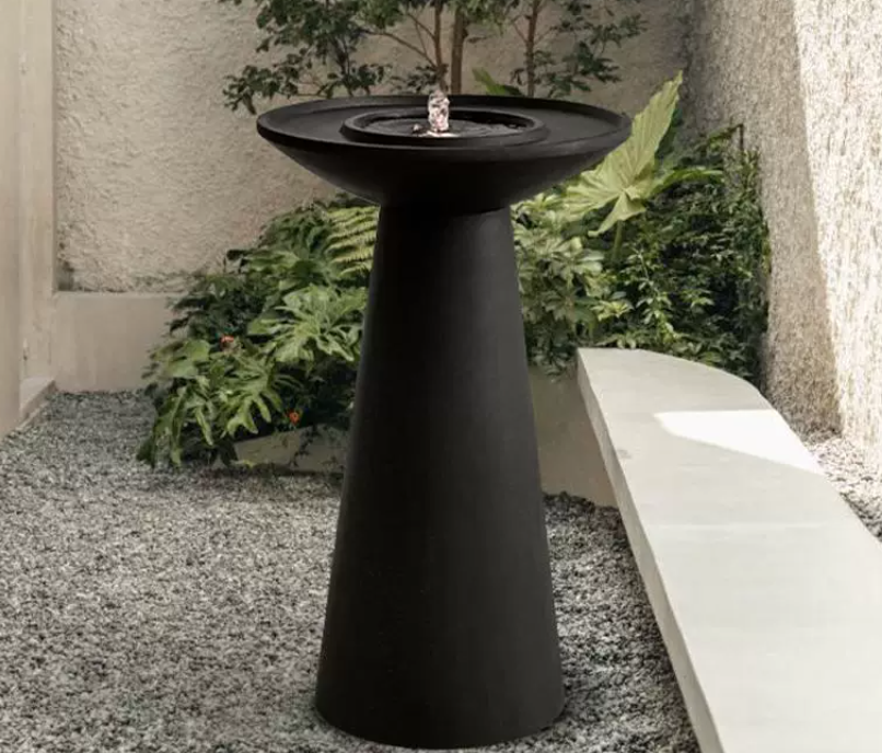  A fountain with a modern design and a serene atmosphere 
