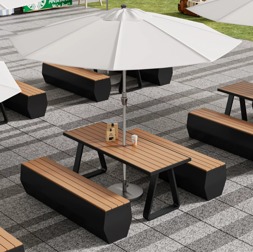  A complete and modern set of a table and two chairs with an umbrella 