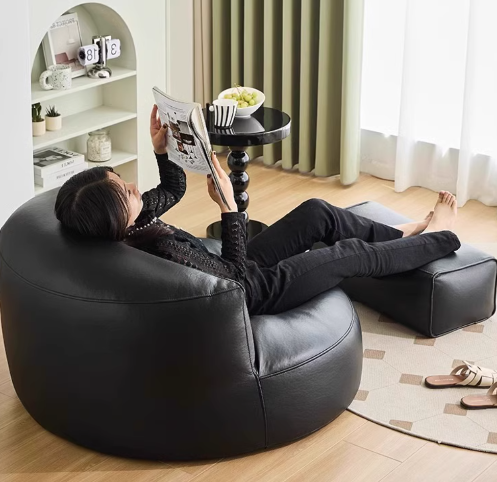 Leather sofa with footrest 