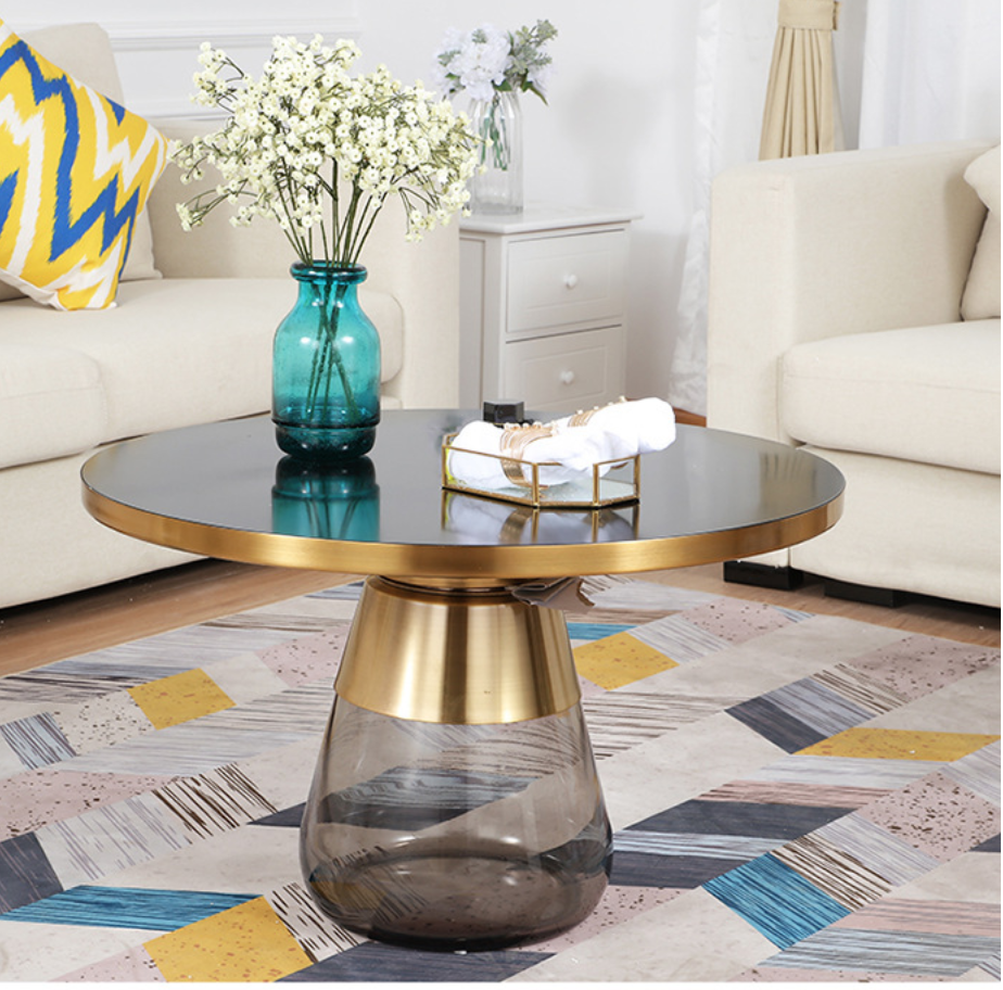  Glass and gold-colored table with details 