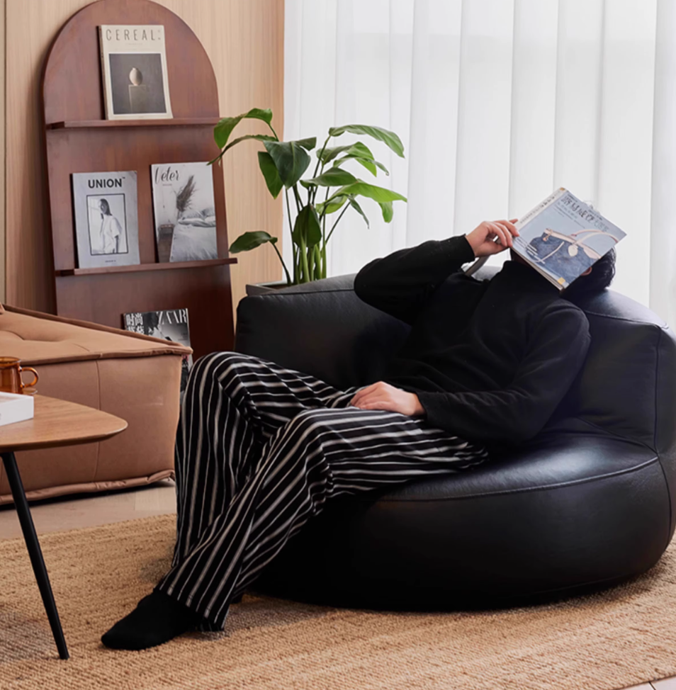  Leather sofa with footrest 