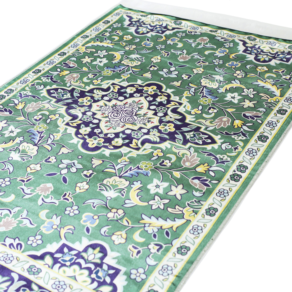 Madinah Prayer Mat inspired by the carpets of the Prophet's Mosque with elegant floral details 