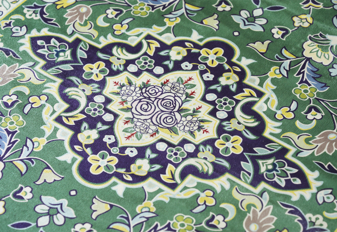 Madinah Prayer Mat inspired by the carpets of the Prophet's Mosque with elegant floral details 