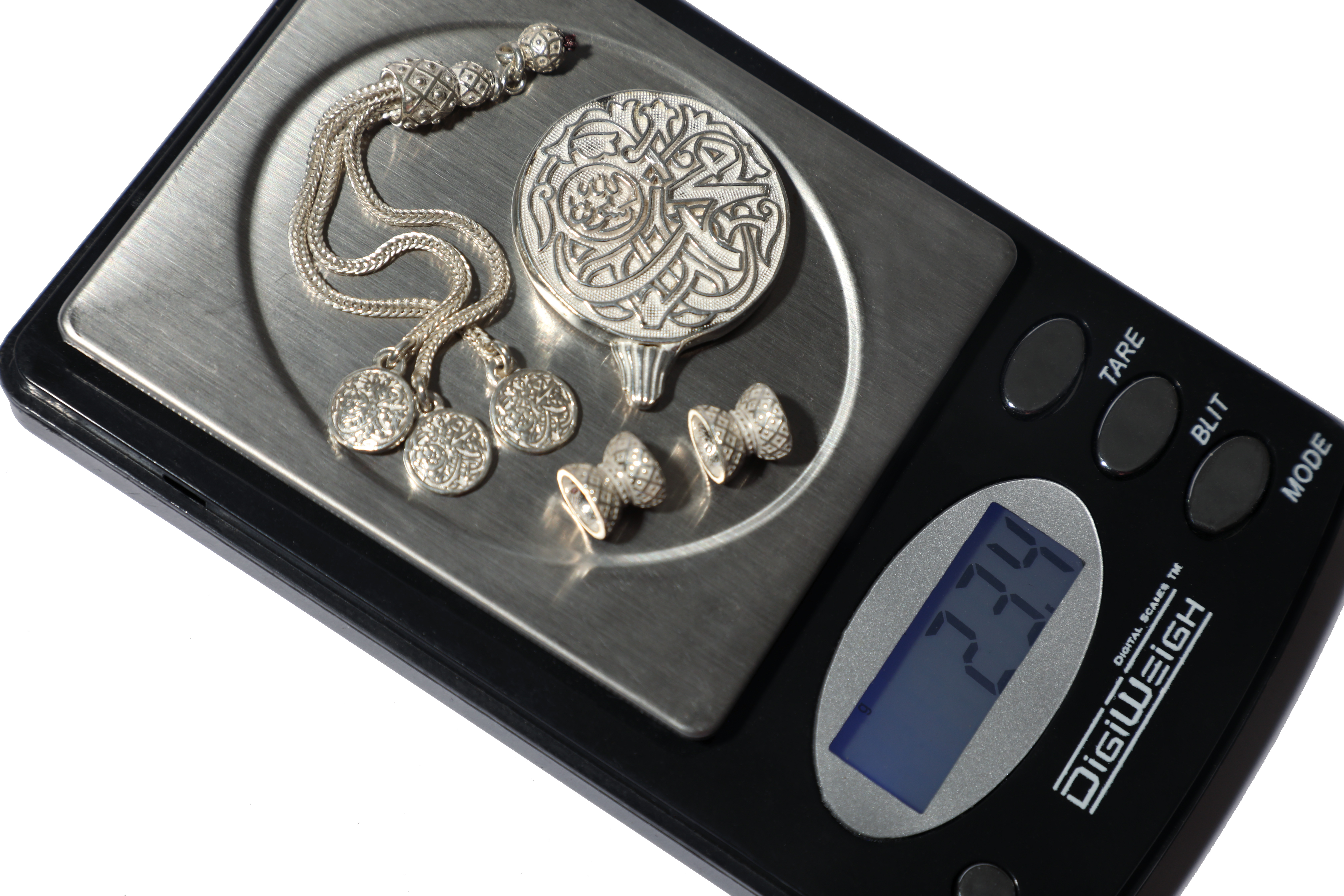 silver weighing 23 grams