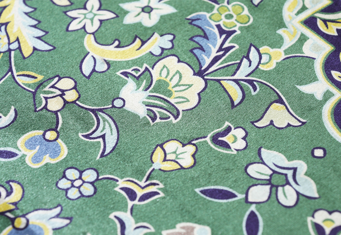 Madinah Prayer Mat inspired by the carpets of the Prophet's Mosque with elegant floral details 