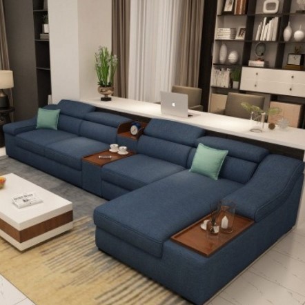 Image of a modern blue sofa with a luxurious design showcasing the quality of the fabric and the comfort of the seats in a stylish living room