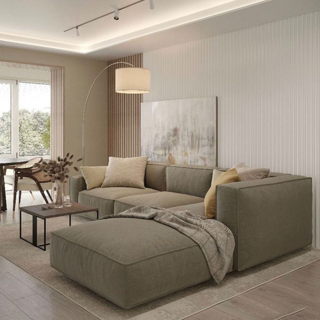 كنبة زاوية عصرية رمادية أنيقة في غرفة معيشة عصرية