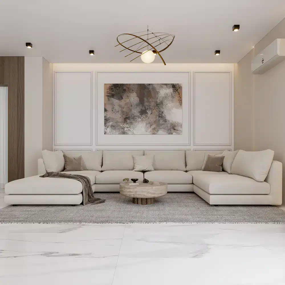 كنبة ركنية بيضاء كبيرة بتصميم حديث في غرفة معيشة أنيقة
