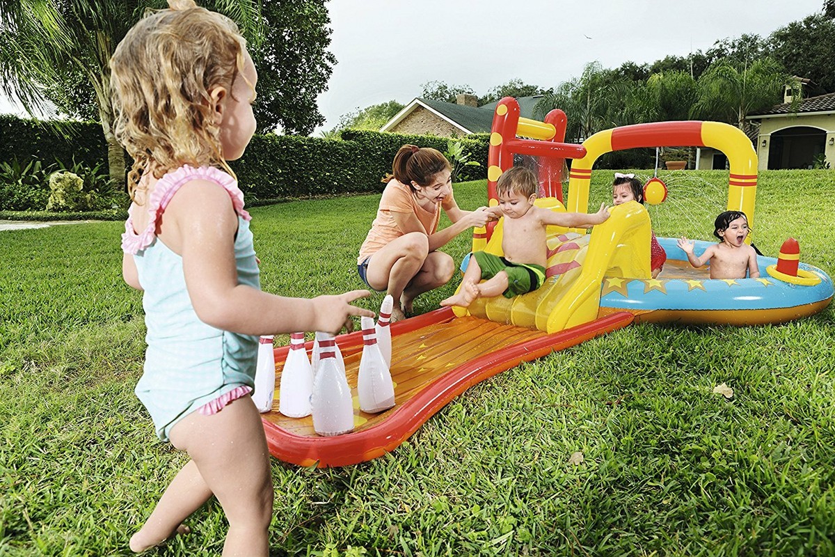  Kids’ pool with an attractive water park design – pool with slide and fun interactive toys 
