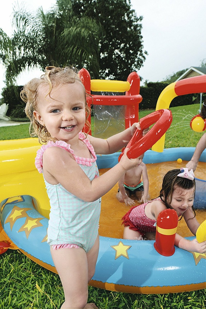  Kids’ pool with an attractive water park design – pool with slide and fun interactive toys 