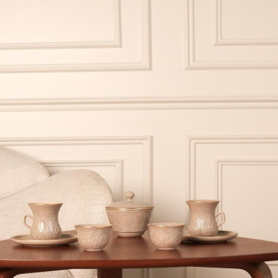 Beige coffee and tea cup set.