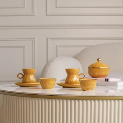 Yellow ceramic coffee and tea set