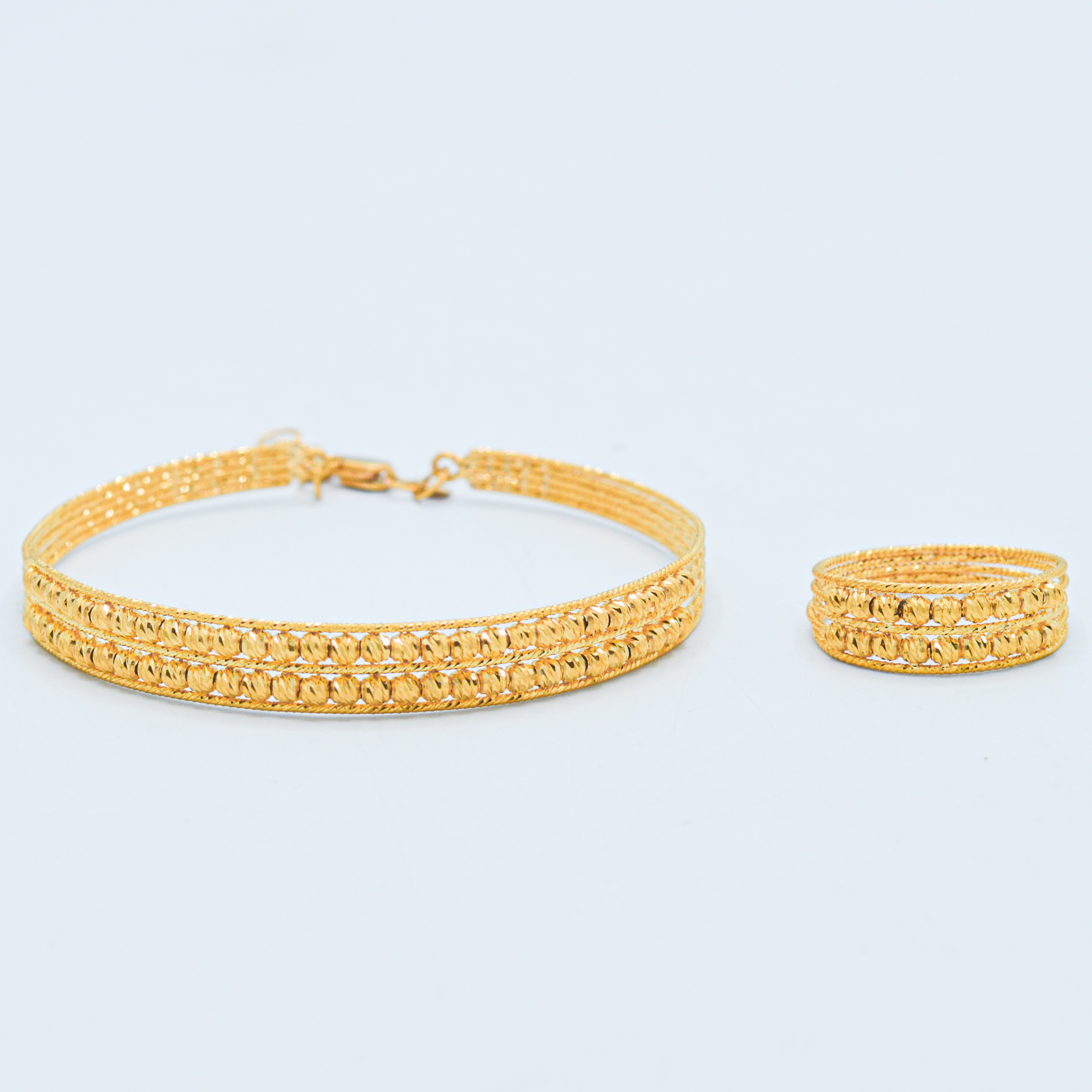  Gold bracelet and ring set  