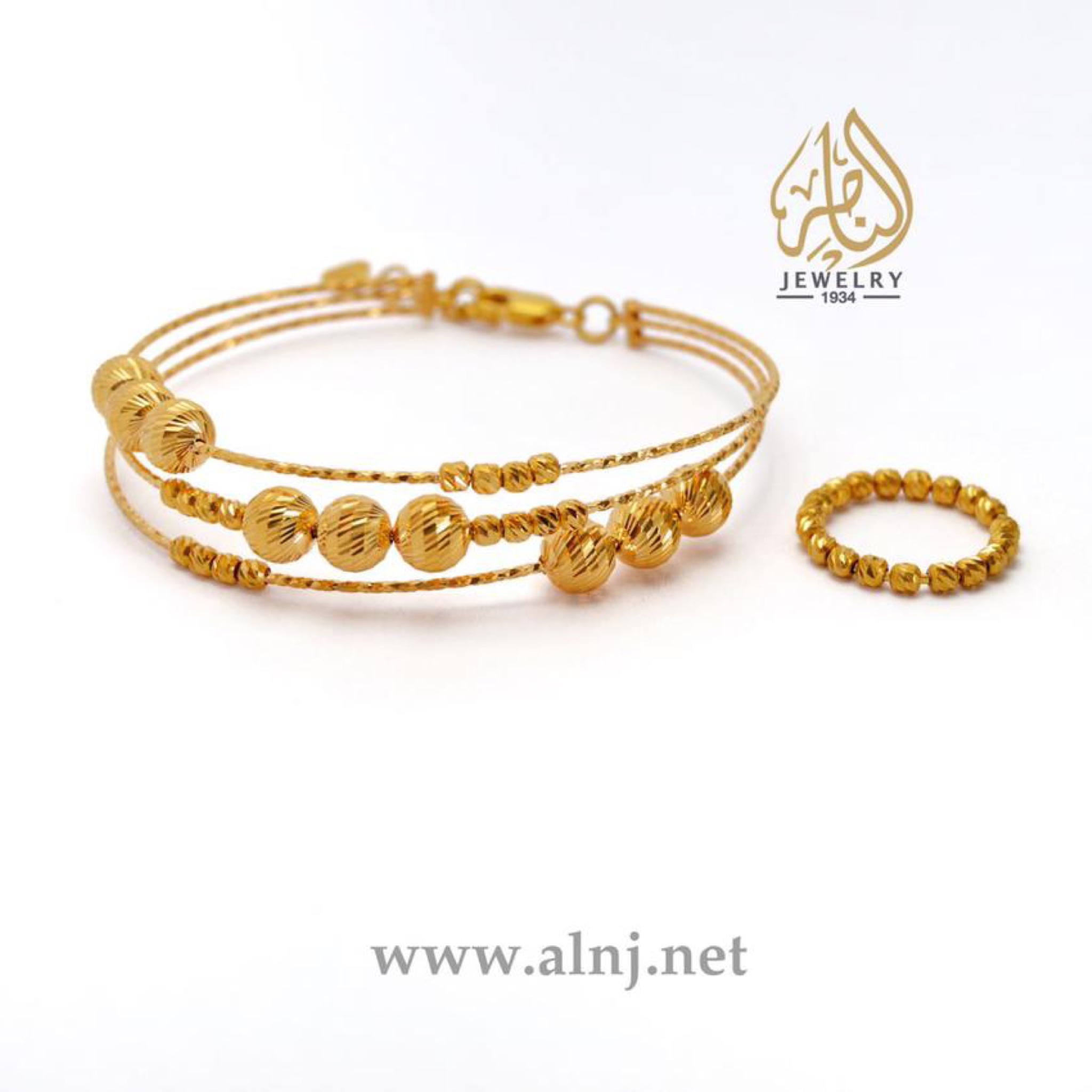  طقم سوارة بلورات ذهب عيار ٢١ 