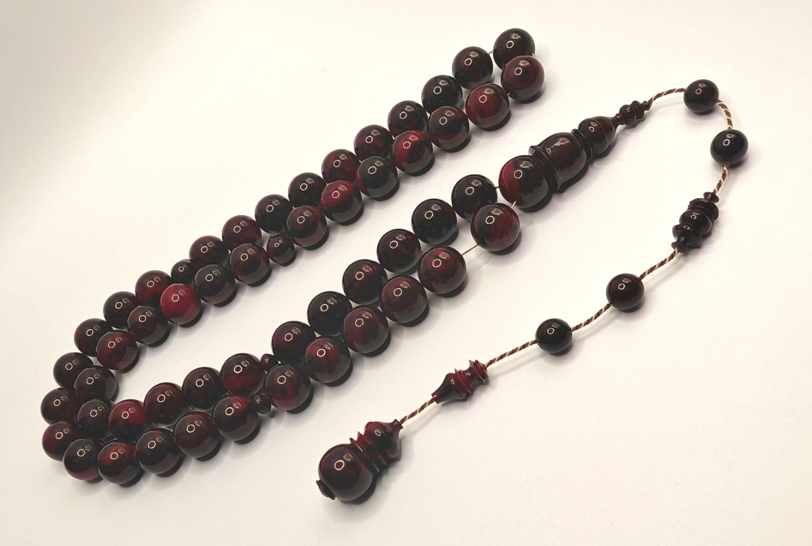 New cast Faturan misbaha in tutti tone, 51 round beads, 59g, with shahid and a refined elegant character.