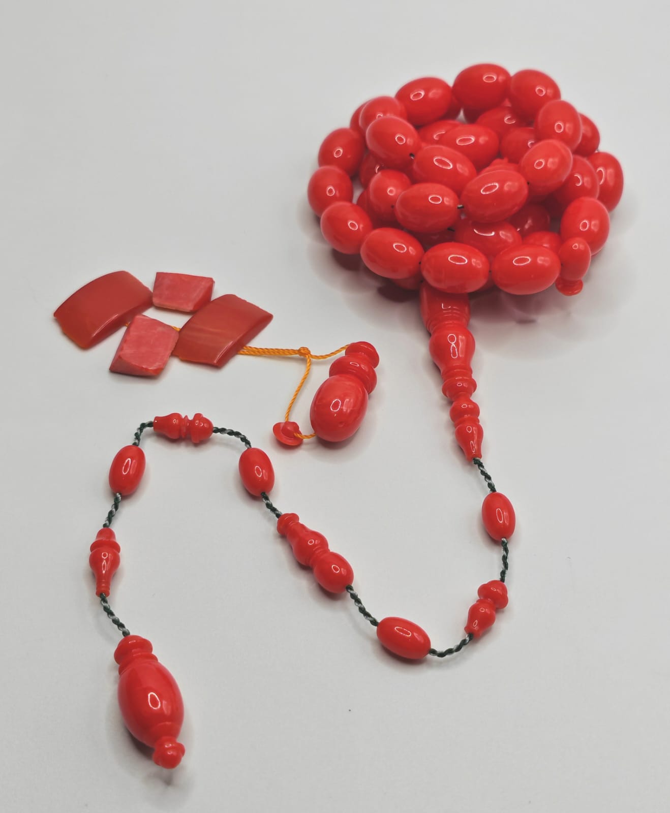 Vintage cast Bakelite Afyash misbaha with 43 red pigeon egg shaped beads.
