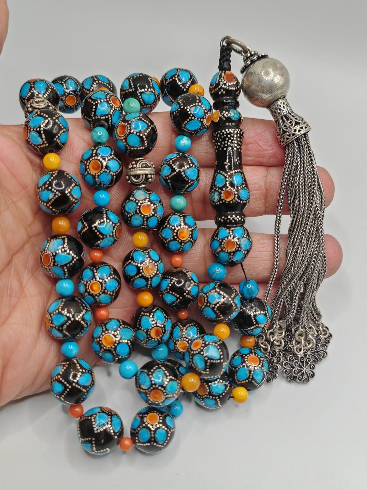 Natural Yusr black misbaha with 33 round beads 14x14mm with silver amber and turquoise accessories.