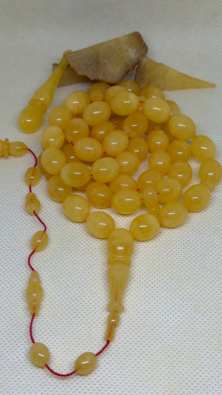 Natural amber single stone misbaha with 55 pigeon egg beads size 10.5x13.5mm.