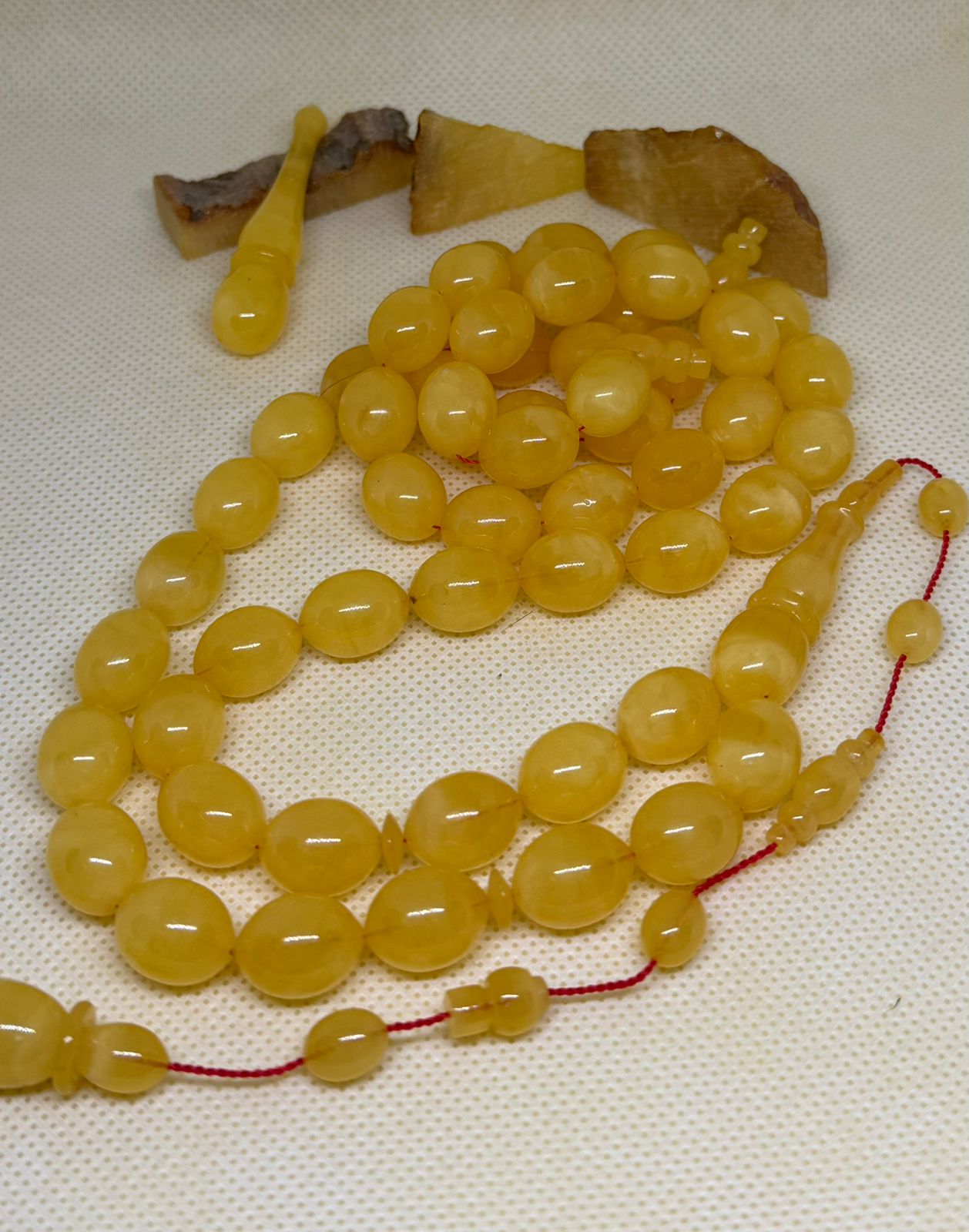 Natural amber single stone misbaha with 55 pigeon egg beads size 10.5x13.5mm.