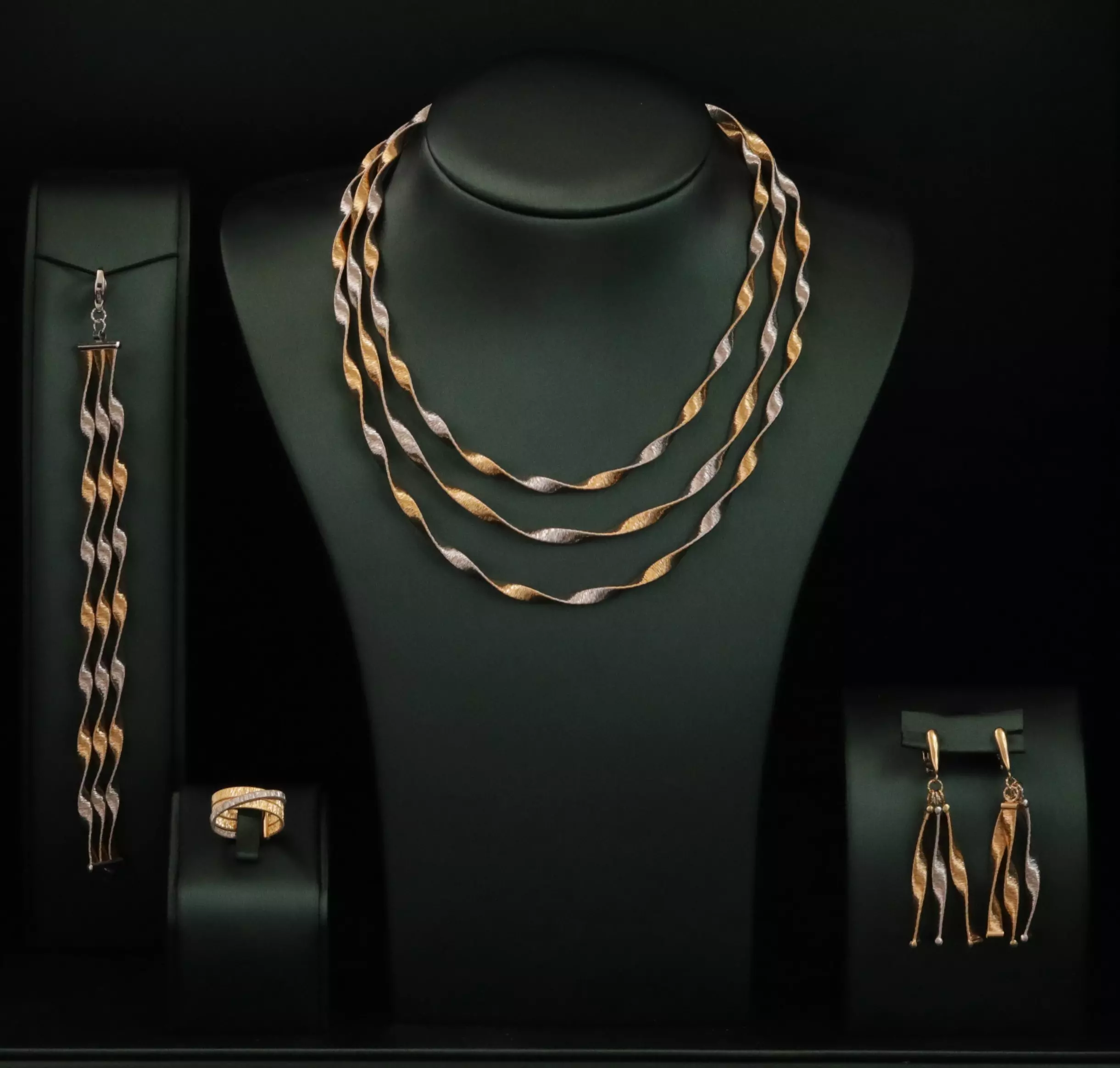 Gold jewelry set including necklace, earrings, bracelets