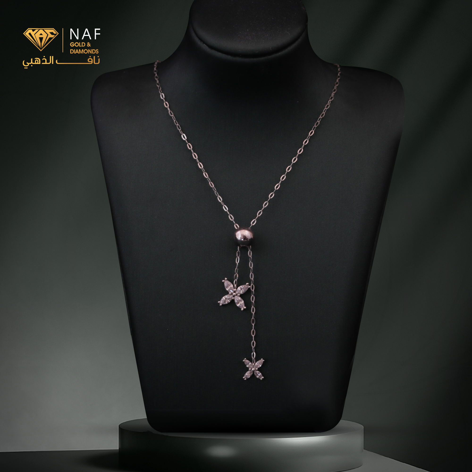 Silver necklace decorated with small stars