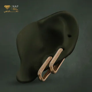قطعة مجوهرات على شكل عاج