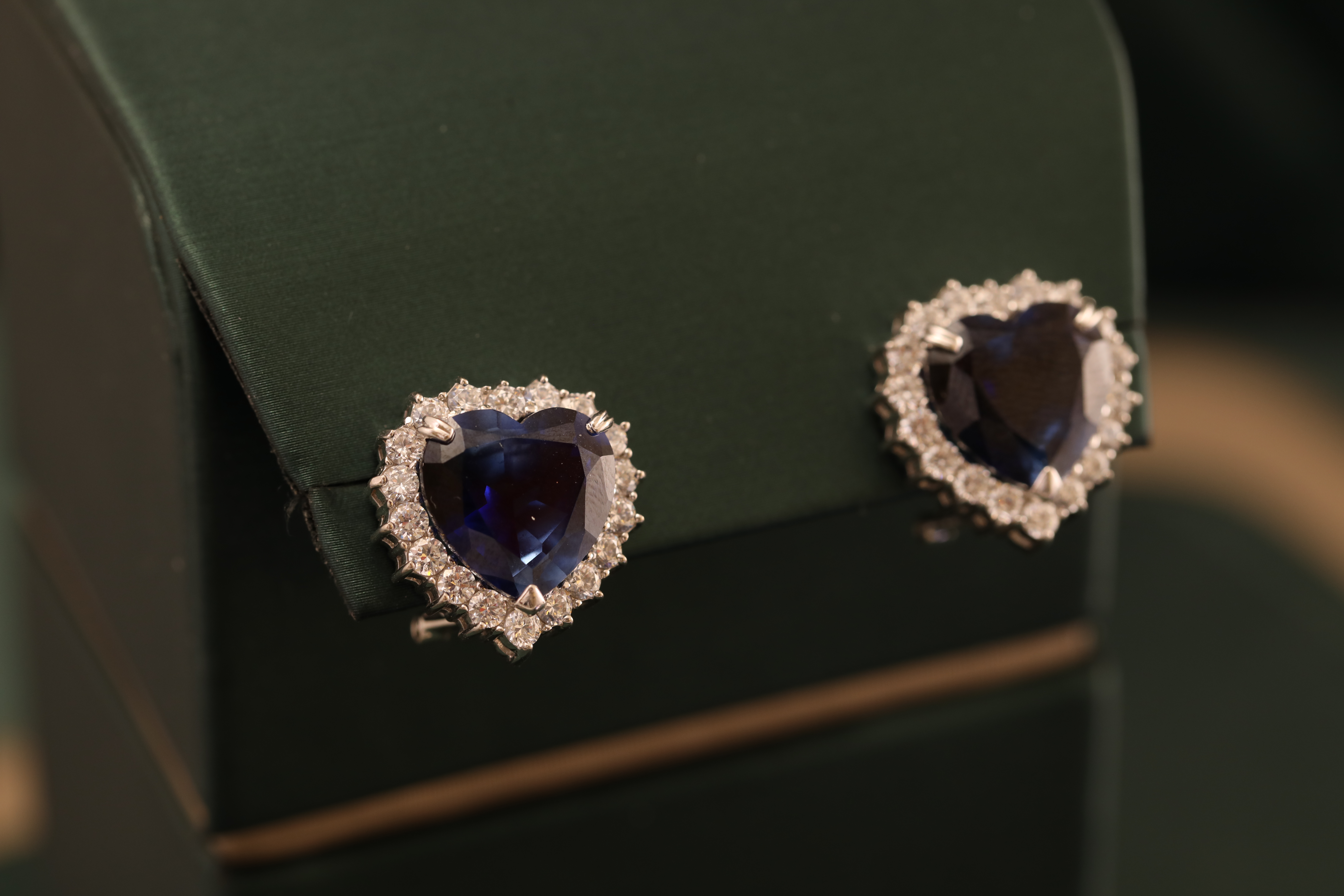 Dark blue heart-shaped stones surrounded by white stones