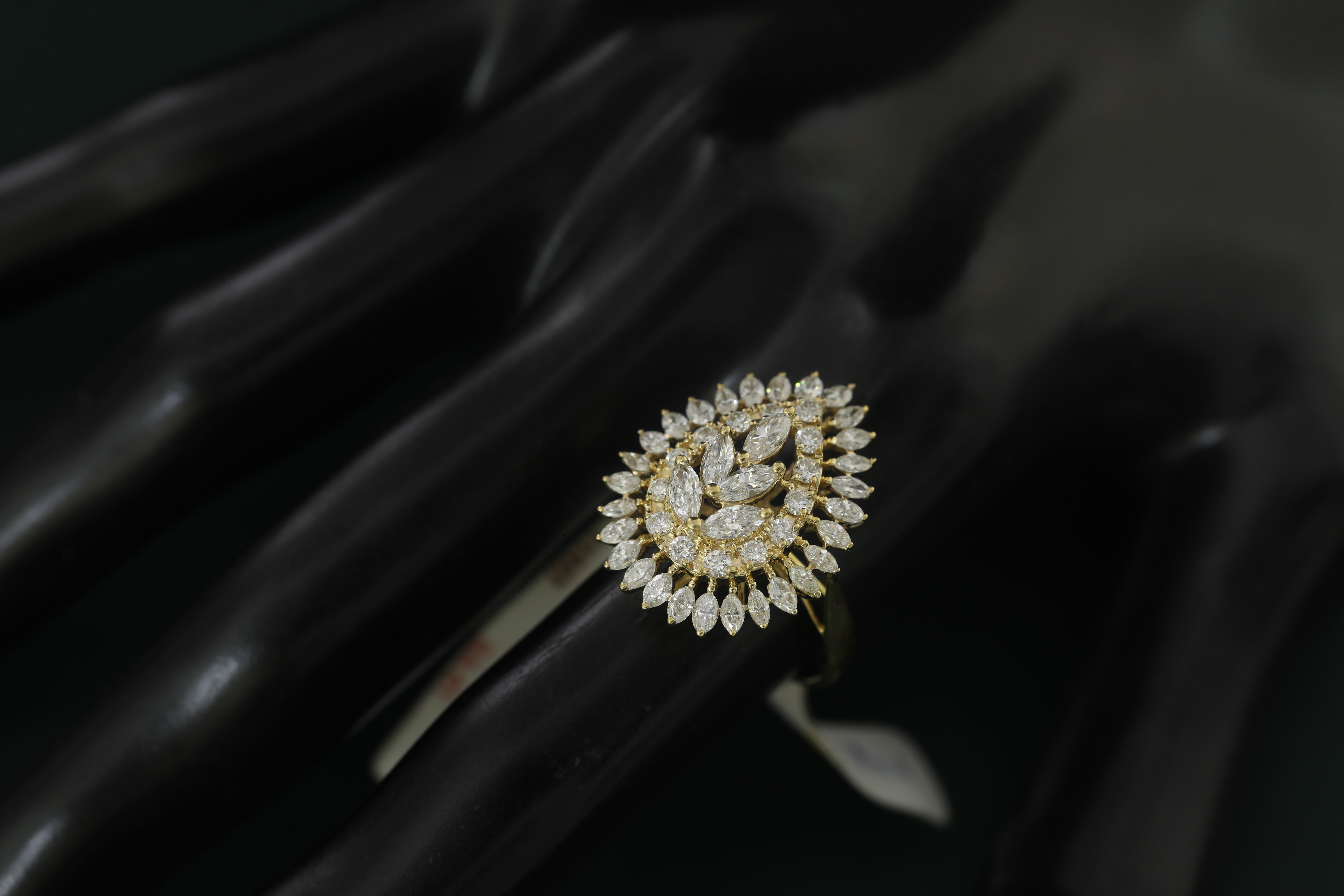 Stunning diamond ring on a warm black background