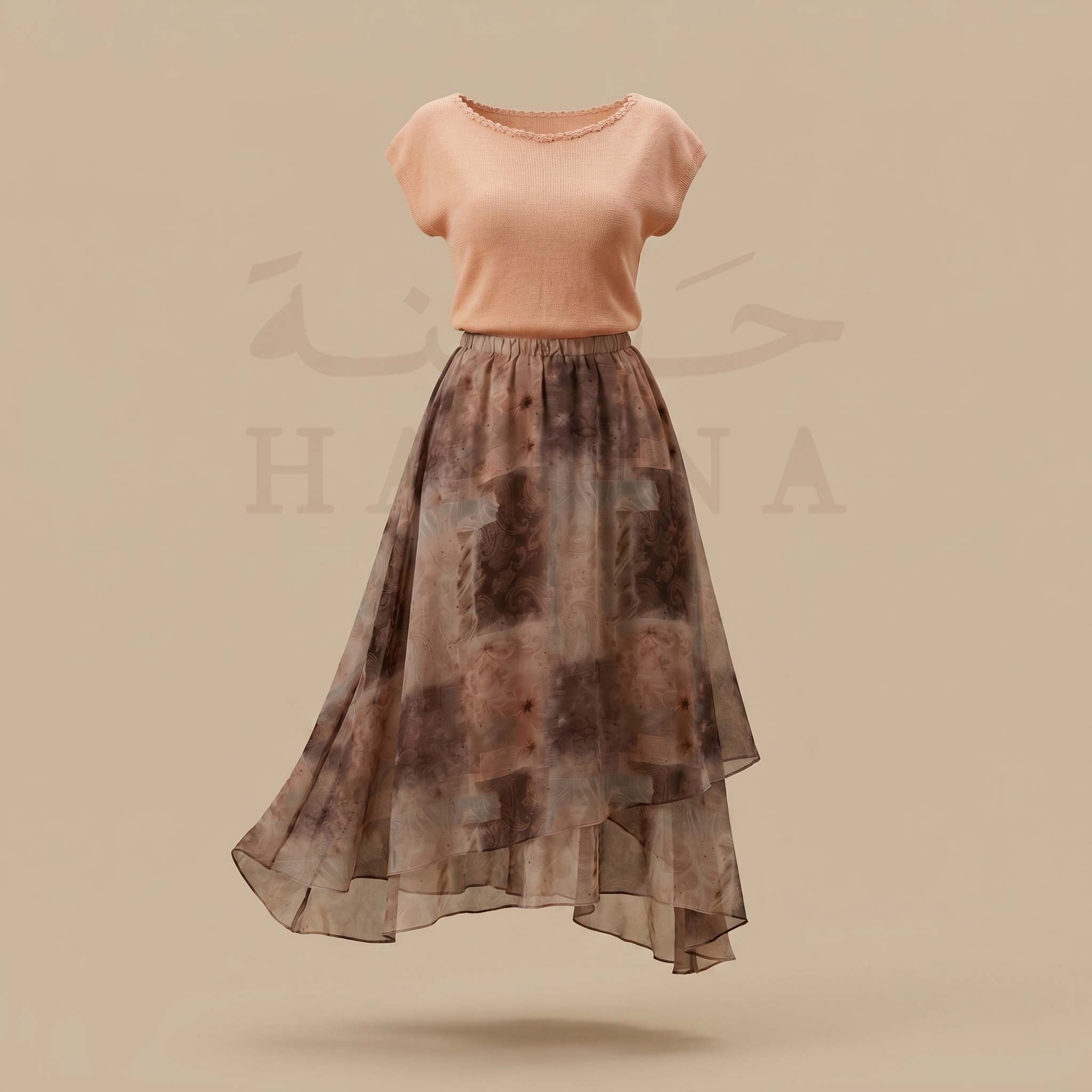 طقم ناعم مشمشي بلوزة تريكو وتنورة ميدي شيفون طبقات