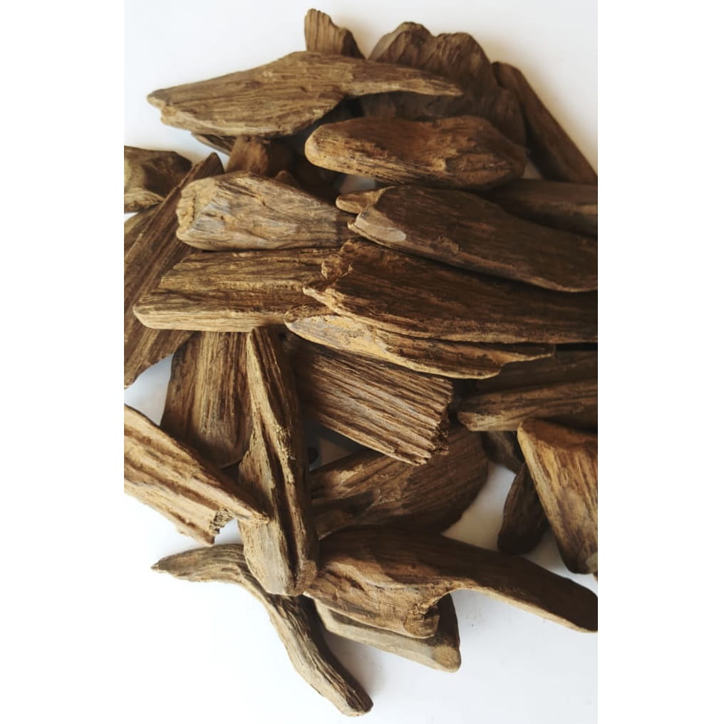 Agarwood pieces unspecified weight and brand product type incense closeup image of parts of brown agarwood