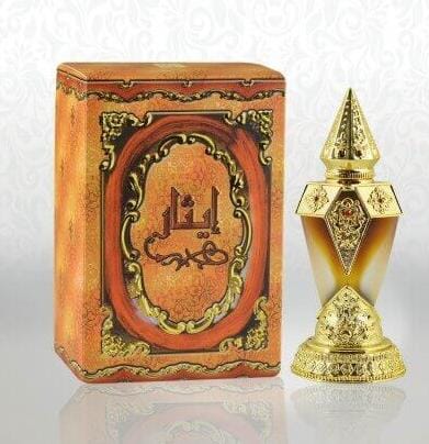 Ithar perfume by Al Sinan the image shows a decorative golden box and a golden perfume bottle with a pointed cap