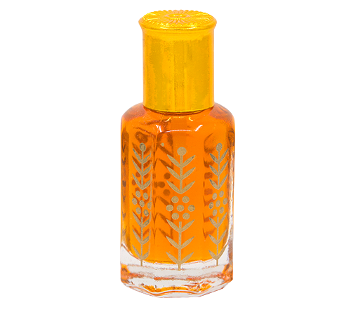 زيت عطري ذهبي اللون مزين بنقوش نباتية بغطاء ذهبي