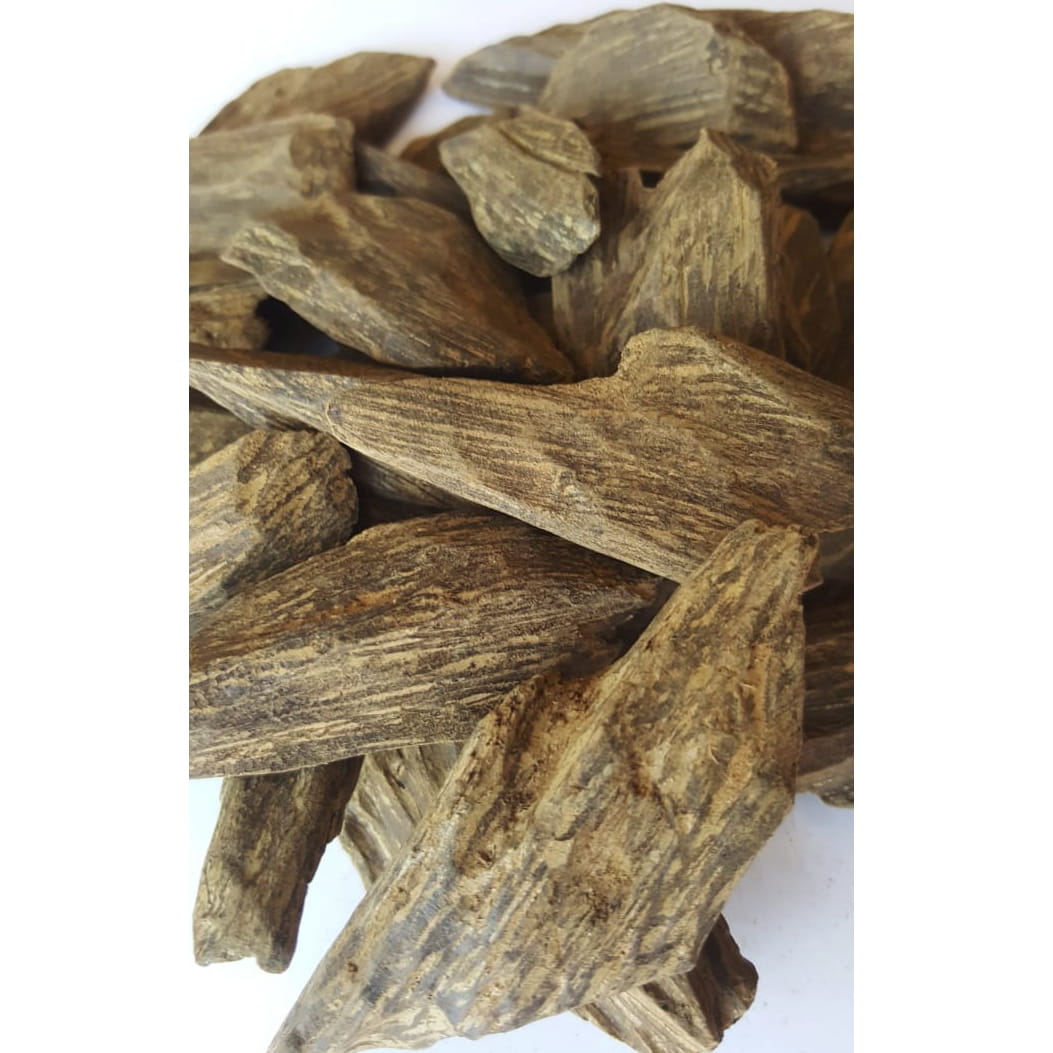 Oud pieces weighing starting from half an ounce product type incense closeup picture showing brown oud pieces